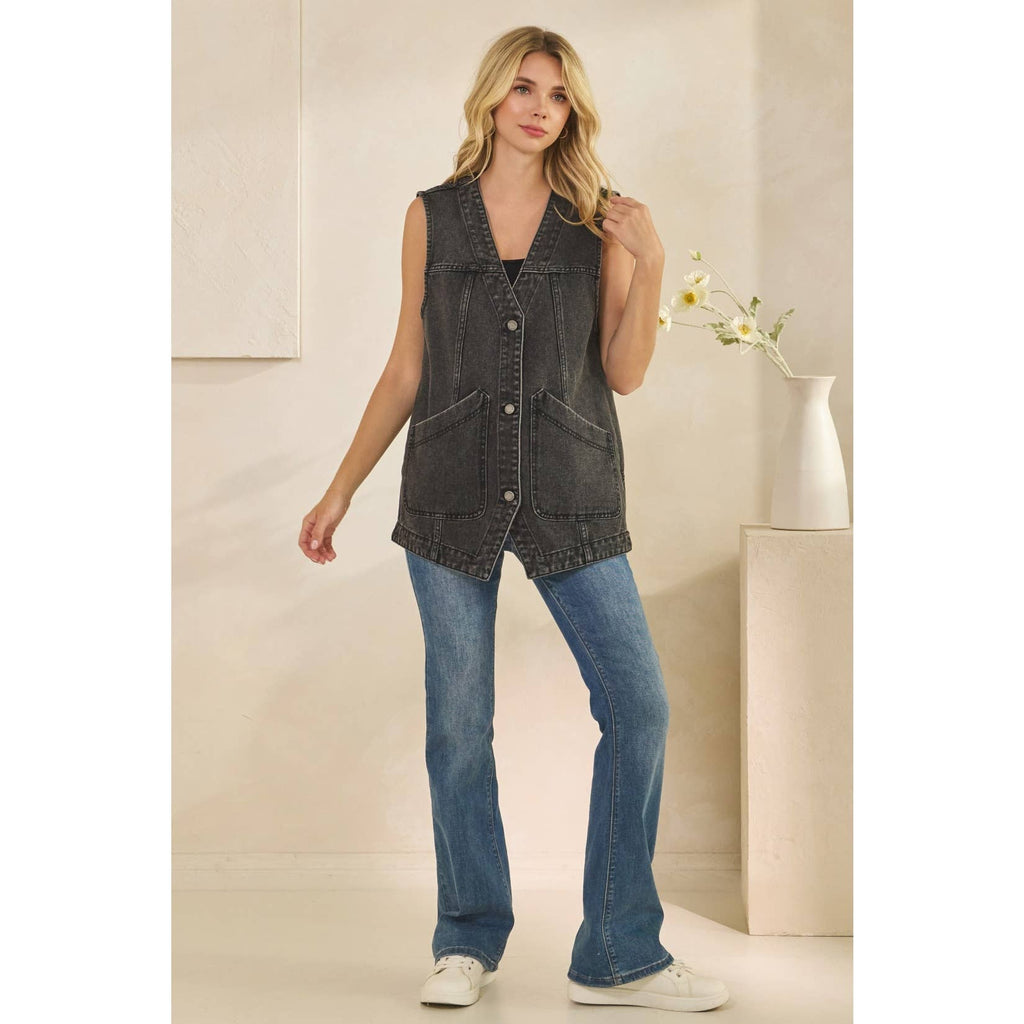 Dark denim sleeveless vest with button front and chest patch pockets