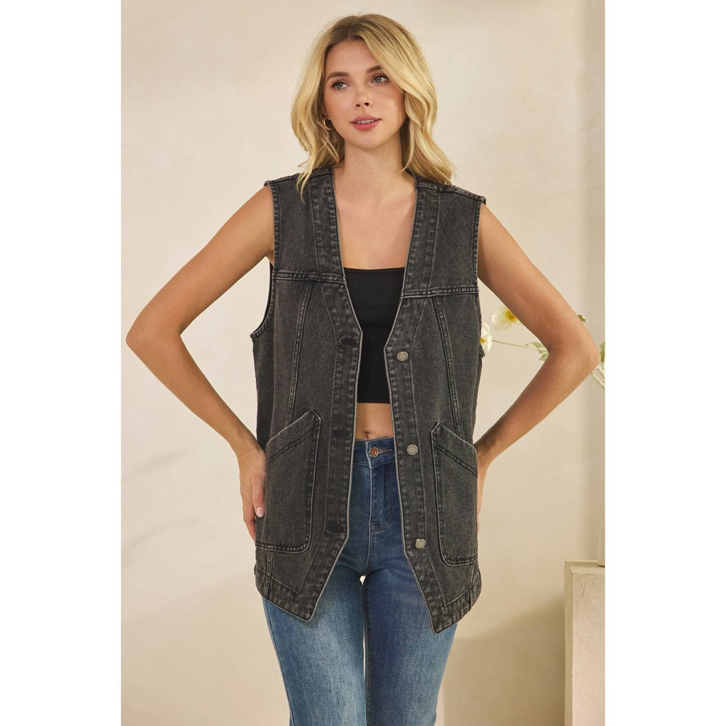 Dark denim sleeveless vest with V-neck, button front, and chest patch pockets