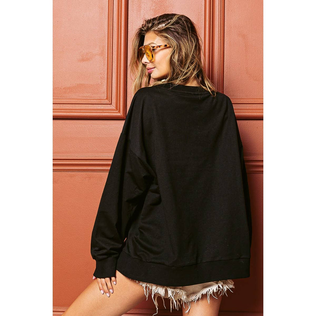 Black sweatshirt back view with plain crew neckline and relaxed fit