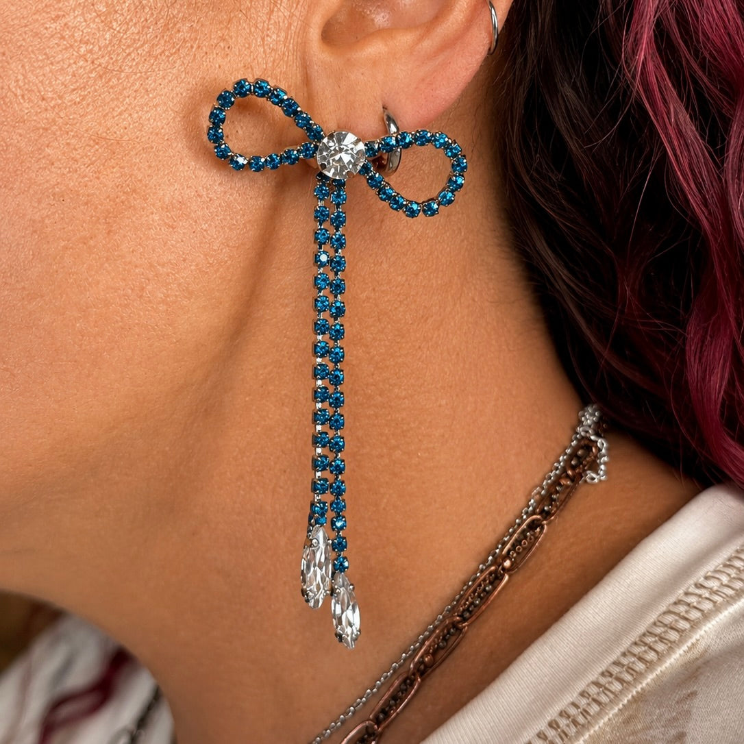 Blue rhinestone lasso earrings with heart-like loops and long dangling crystal tassel