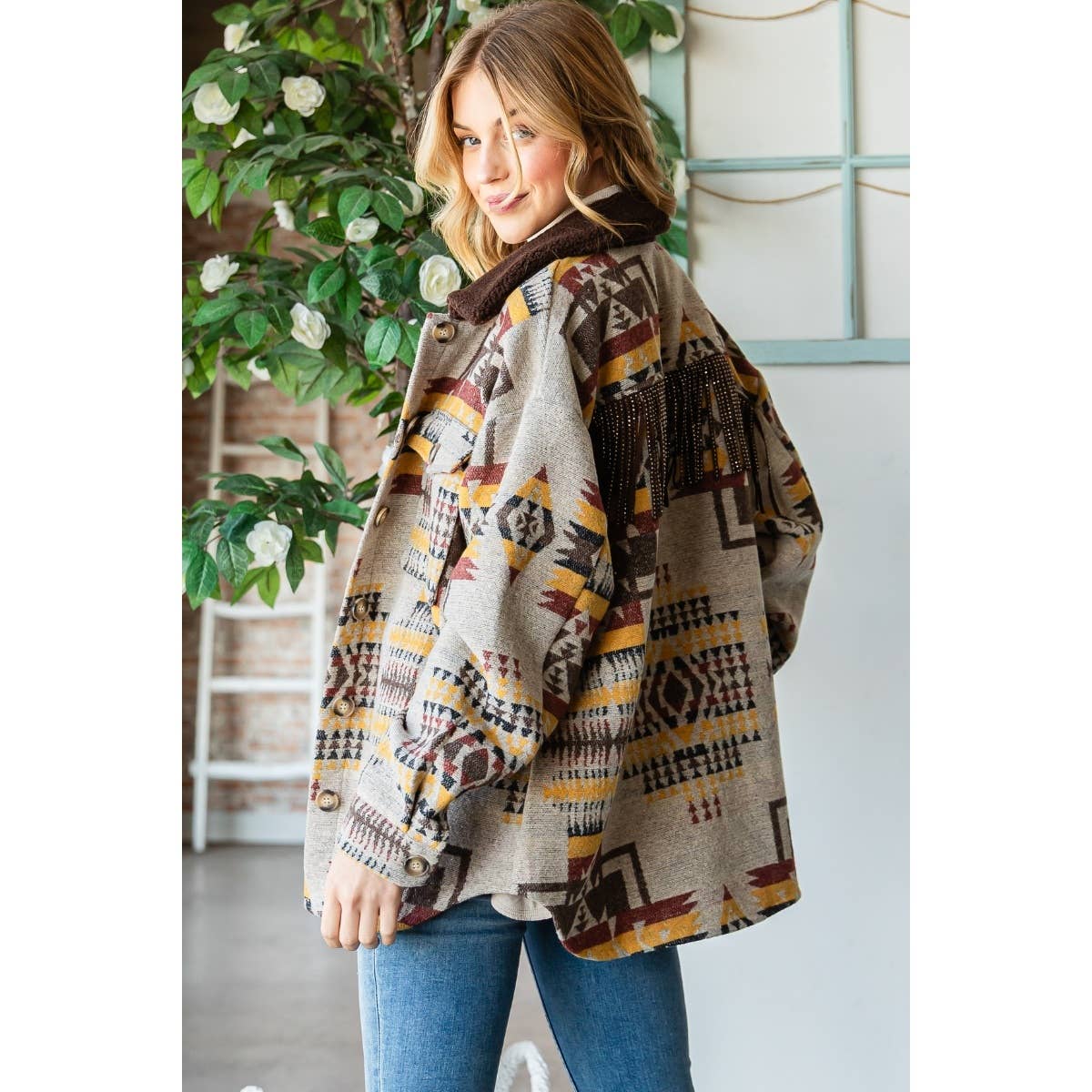 Taupe patterned thick knit shacket side/back view with fringe detail at the upper back