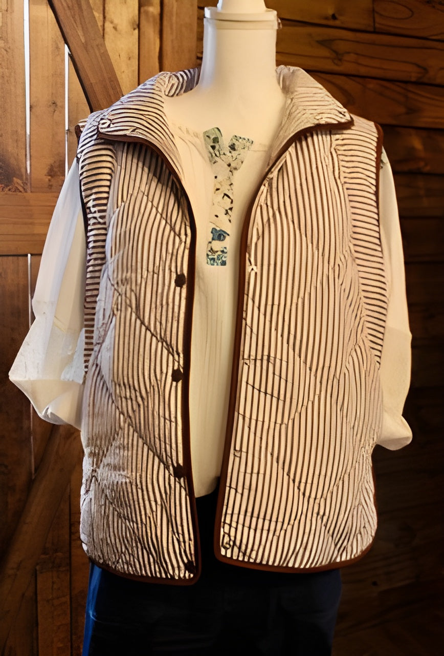 Brown striped quilted puffer vest on mannequin with stand collar and button placket