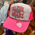 Pink baseball cap with 'Bless Your Heart' embroidery and heart patch