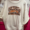 Cream crewneck sweatshirt with Raider victory 'Blessed Hearts' front graphic