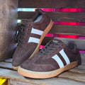 Brown suede lace-up sneakers with white side stripes and gum sole