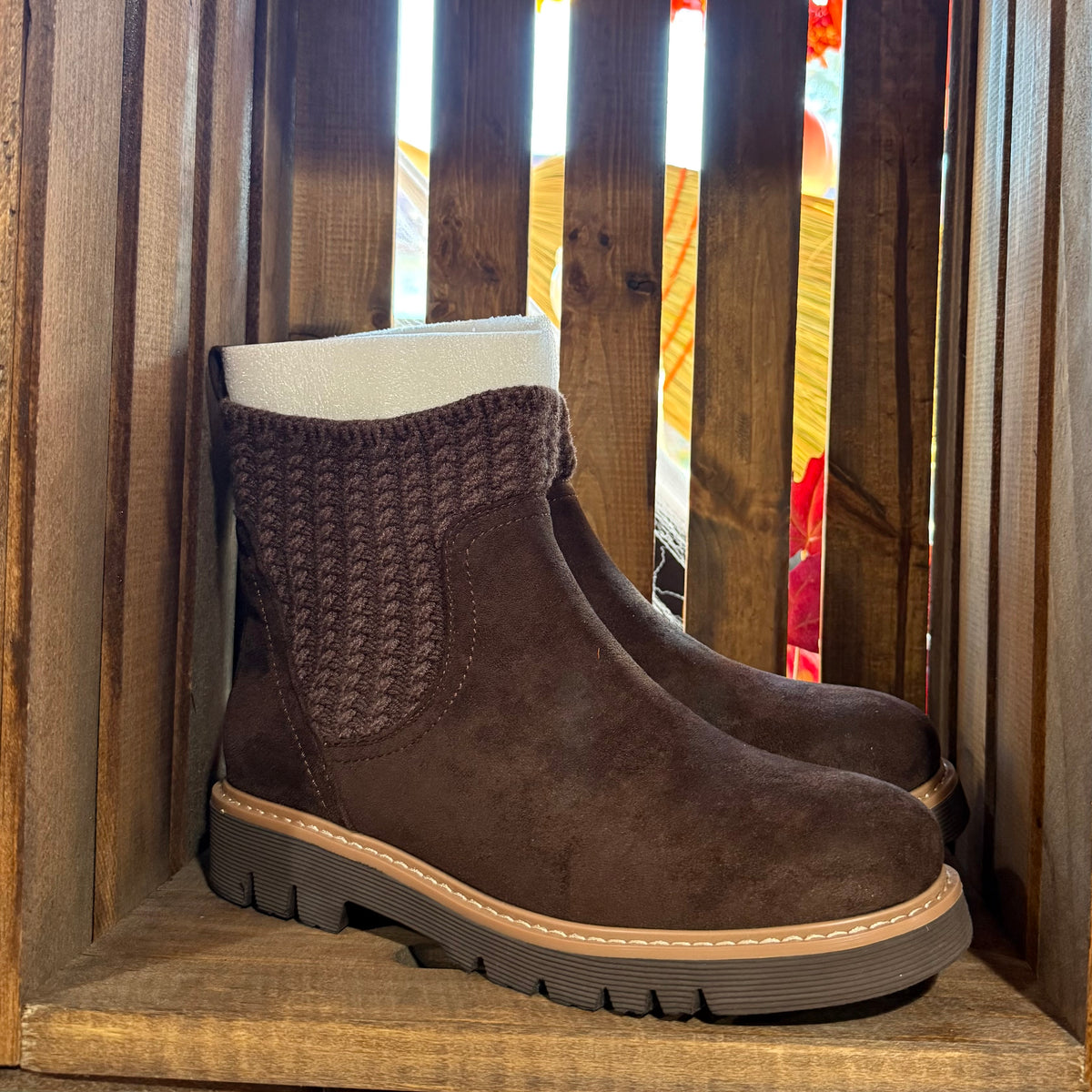 Chocolate faux suede ankle boots with knit cuff and tan stitching, chunky lug sole