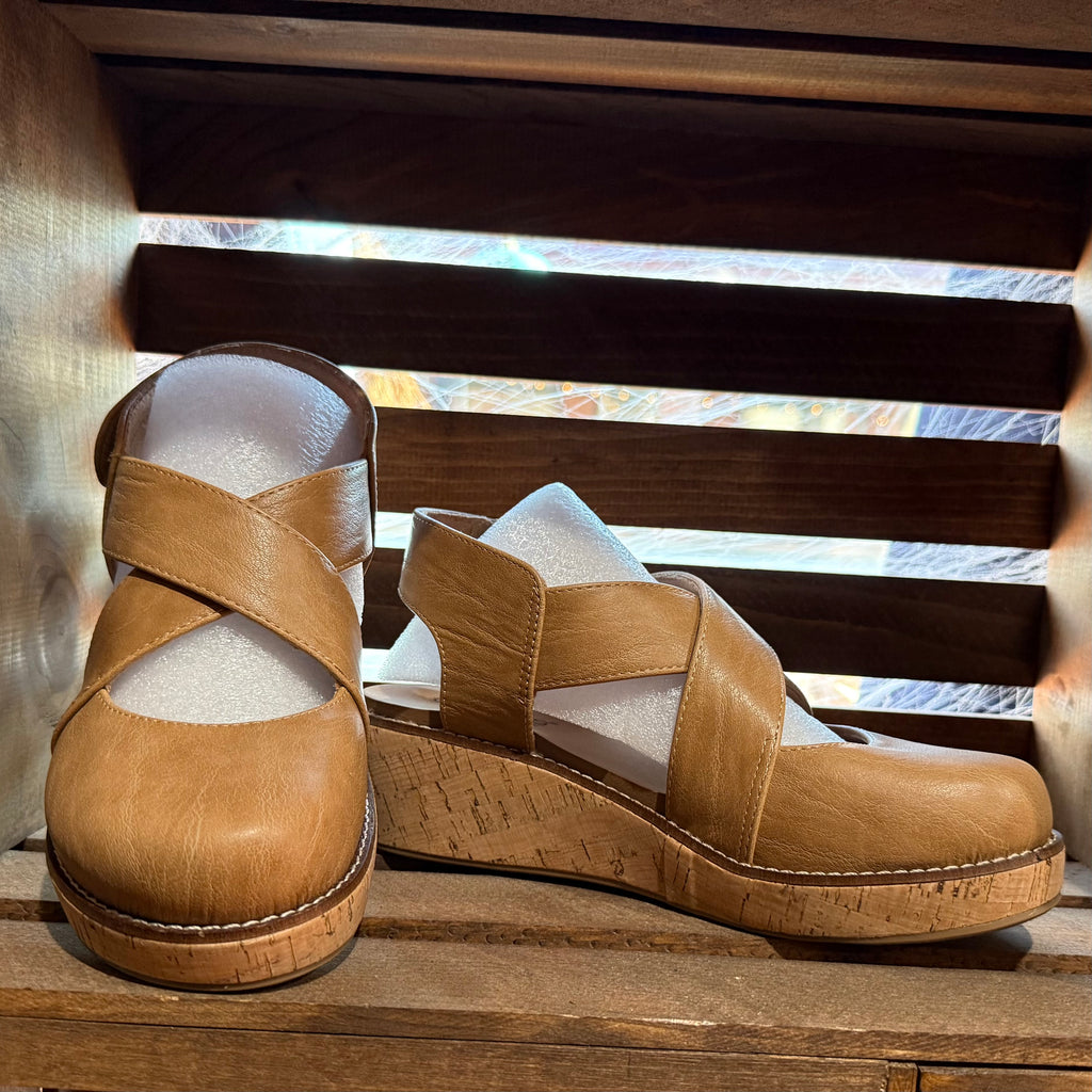 Tan leather wedge clogs with crossover strap and cork-look sole, open toe