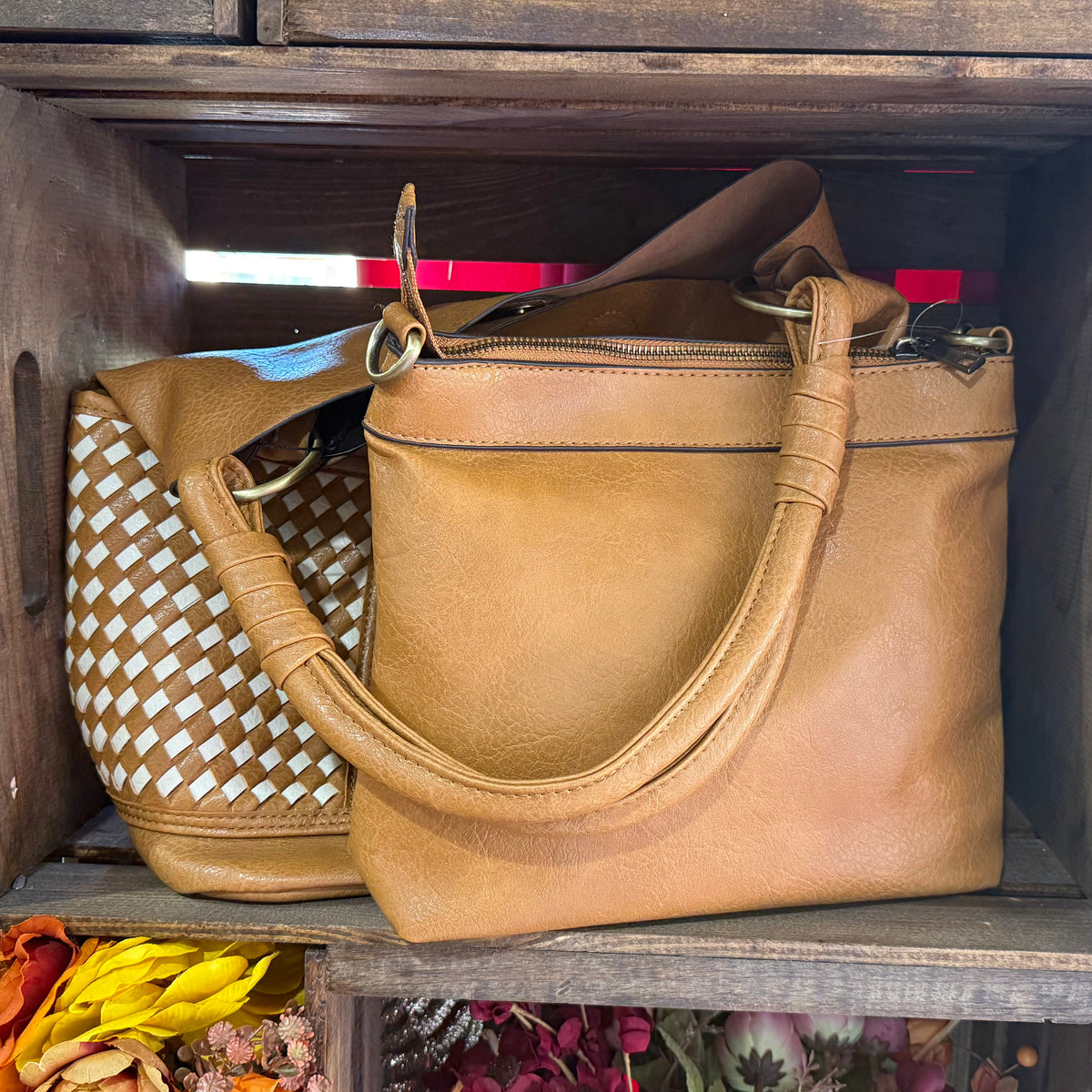 2-piece handbag set featuring tan zip-top tote with braided strap and woven small bag