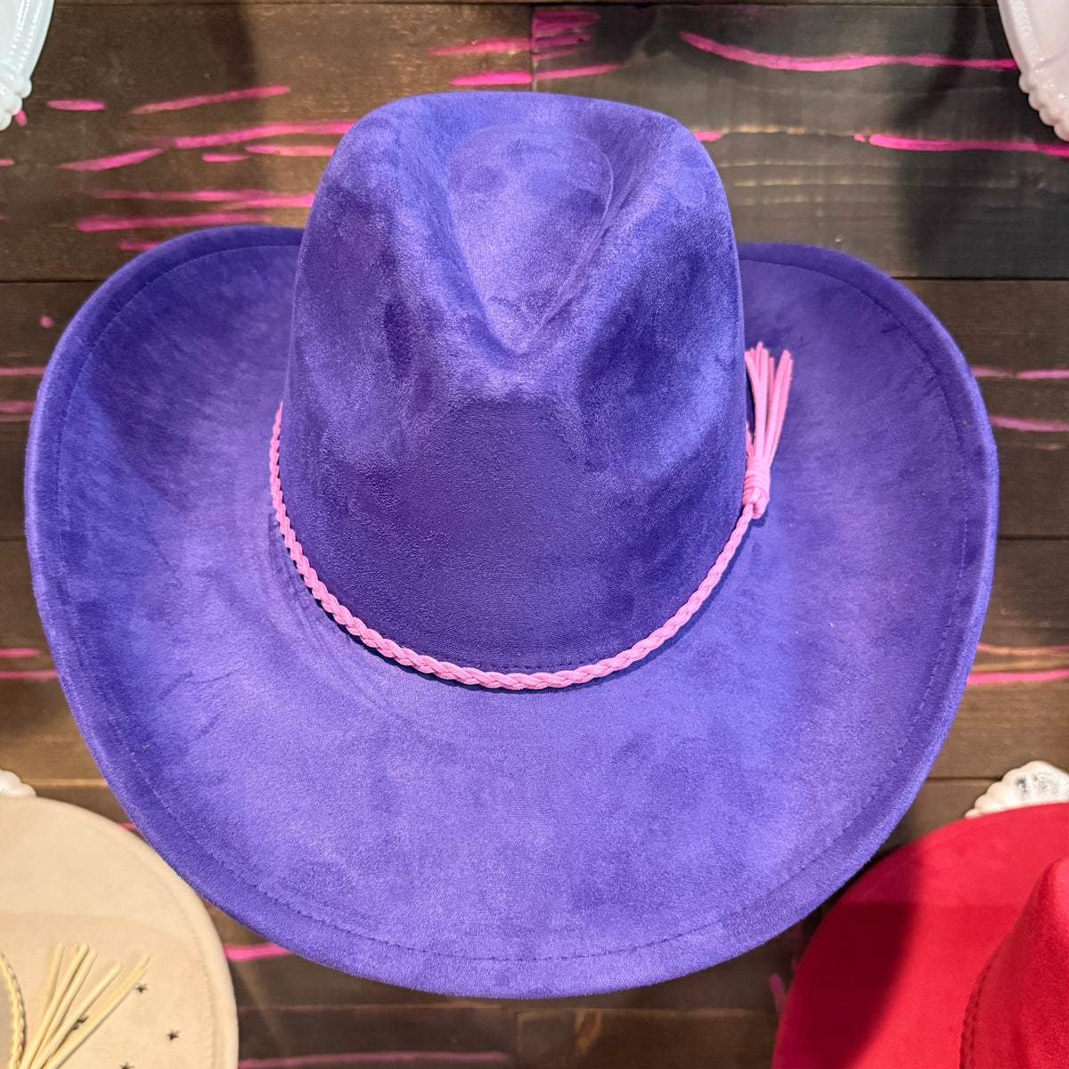 Purple vegan suede cowboy hat with wide brim and stitched band
