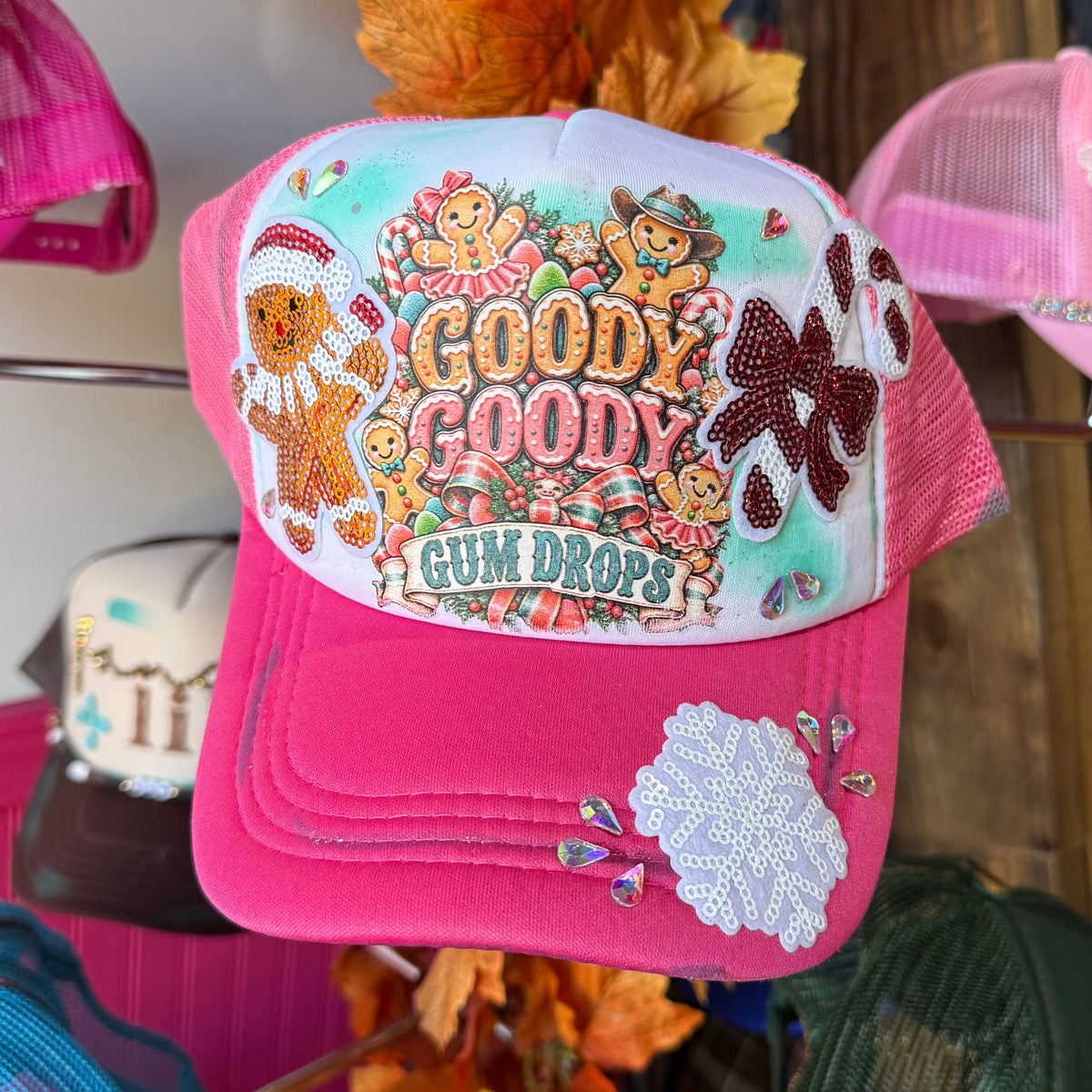 Pink kids baseball cap with embroidered Gum Drops logo and sequin clover patch