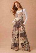 Brown floral patchwork wide-leg overalls with adjustable straps and button front