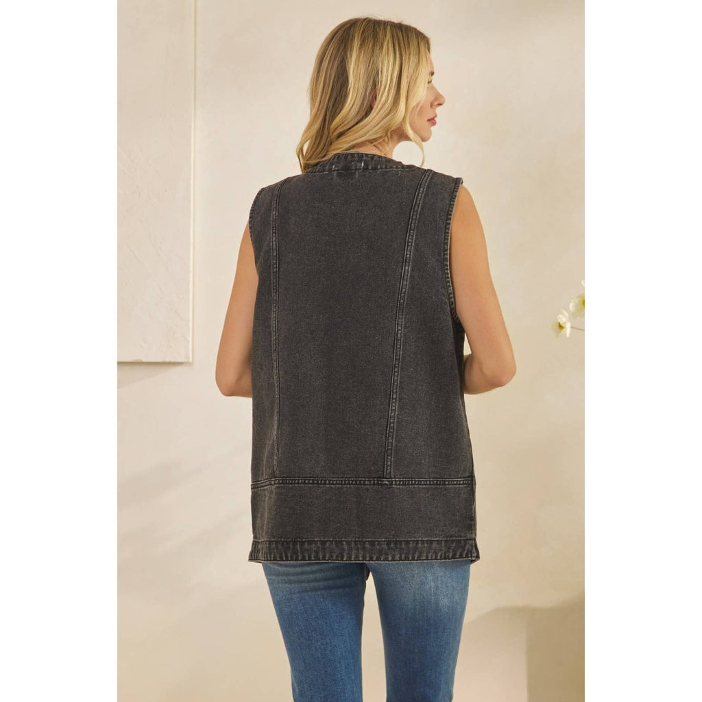 Dark denim vest back with yoke seams and curved hem