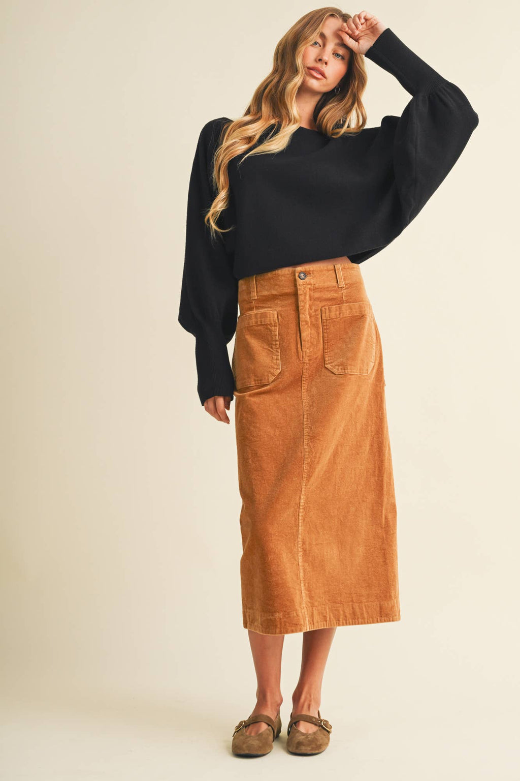 Black boat-neck dolman sleeve pullover sweater, front view
