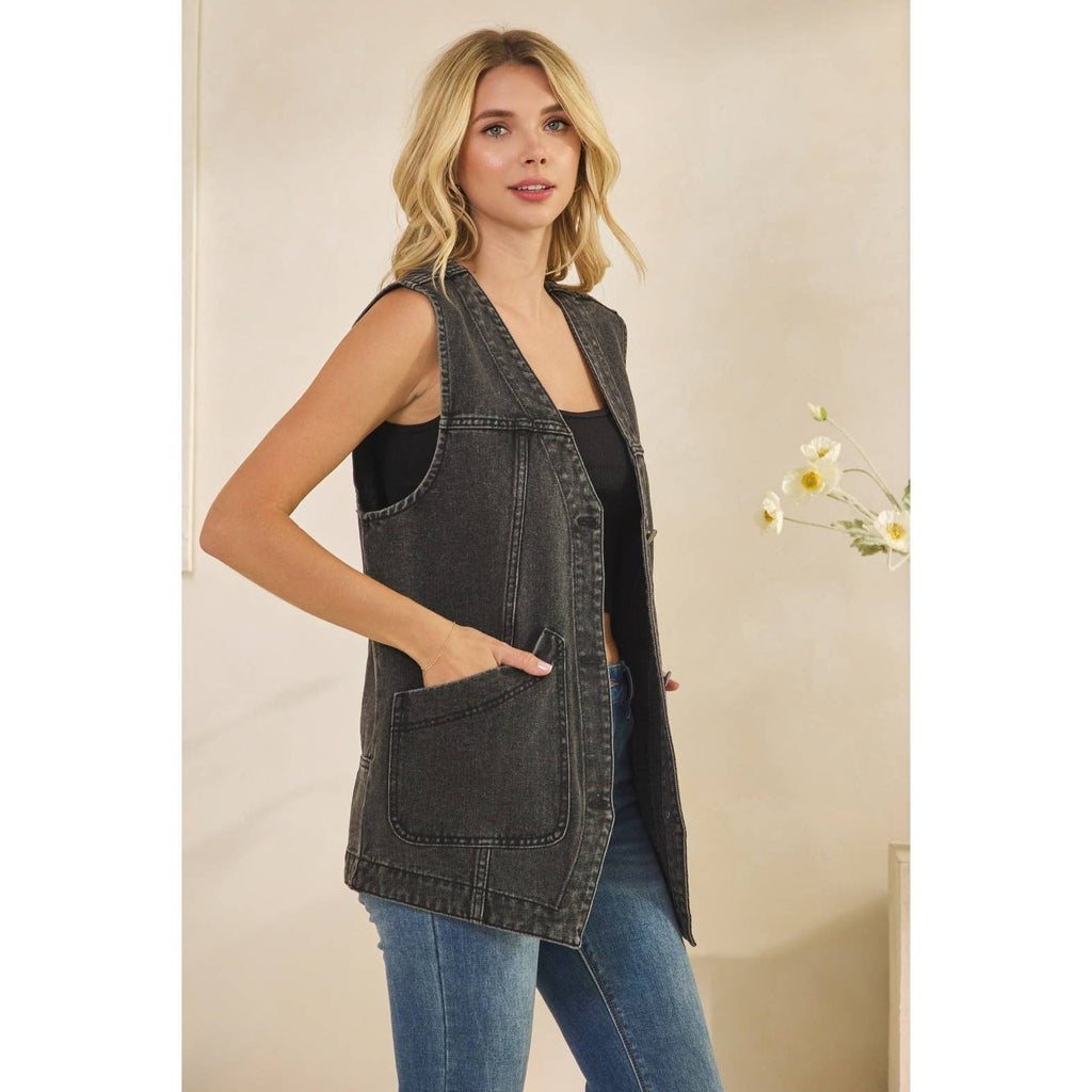 Dark denim sleeveless vest with large front patch pocket and button closure