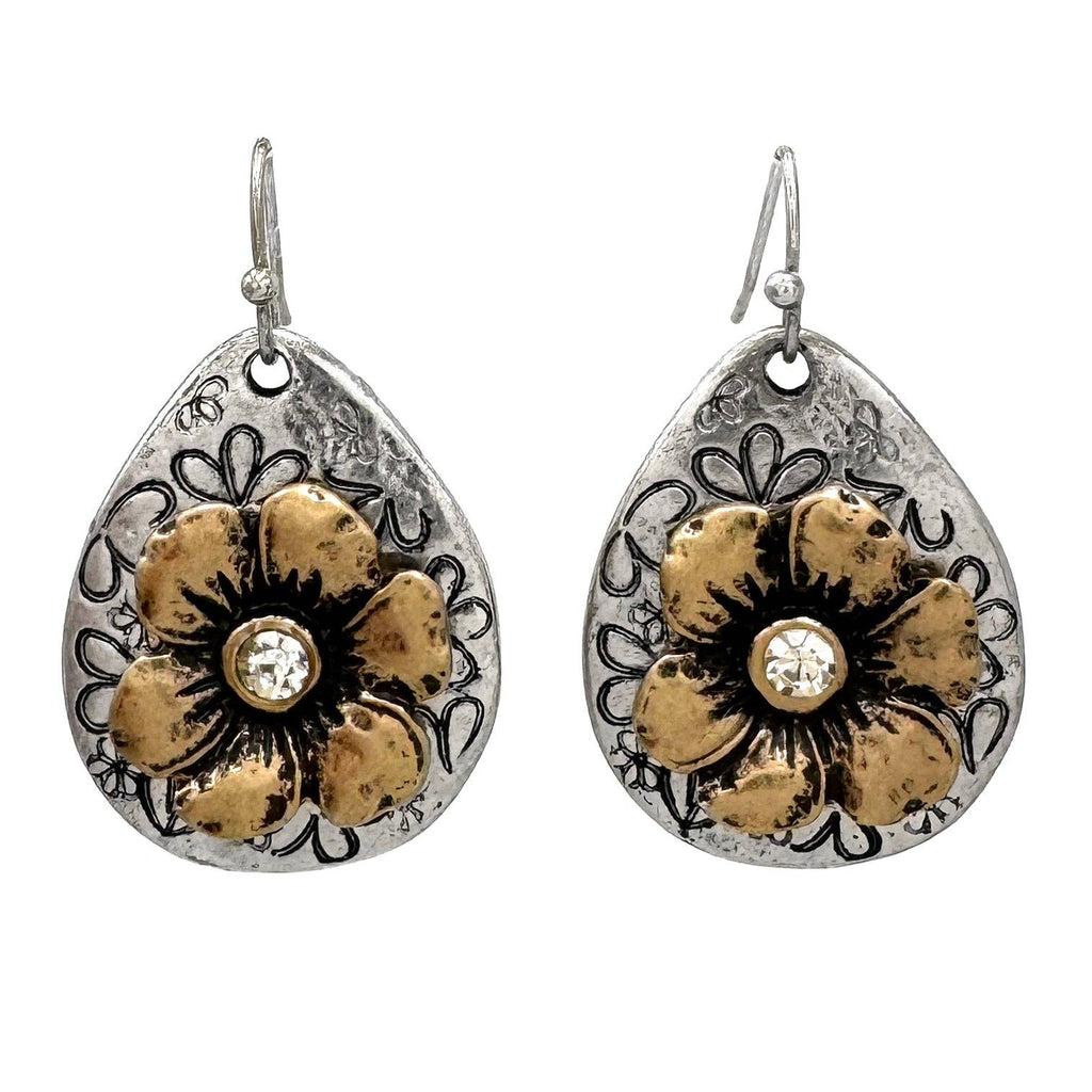 Pair of teardrop metal earrings with engraved border, gold floral details, rhinestone centers.