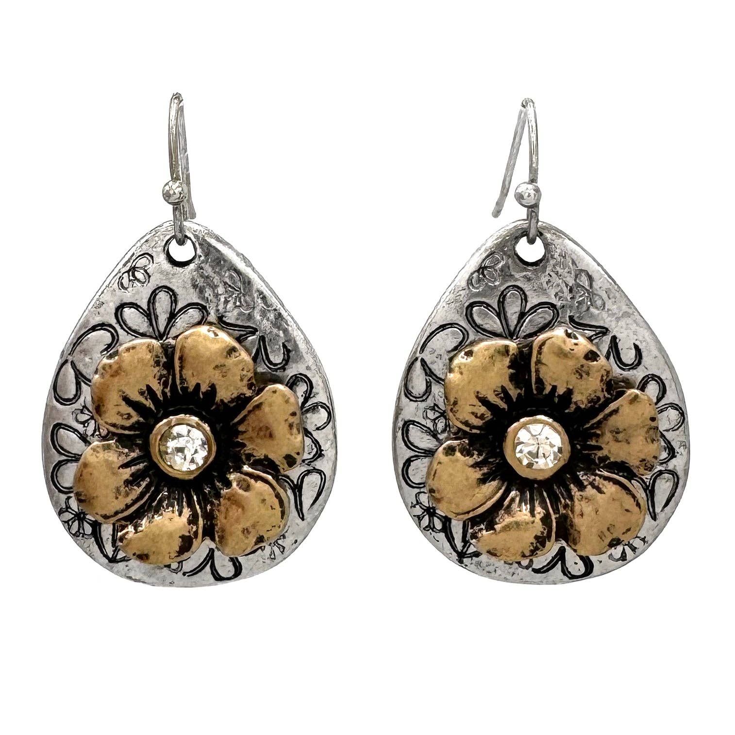 Pair of teardrop metal earrings with engraved border, gold floral details, rhinestone centers.