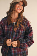 Plaid quilted jacket in multi colors with dark corduroy-trim collar and button front.